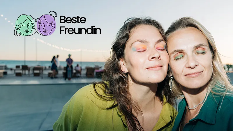 Zwei beste Freundinnen mit buntem Lidschatten und geschlossenen Augen