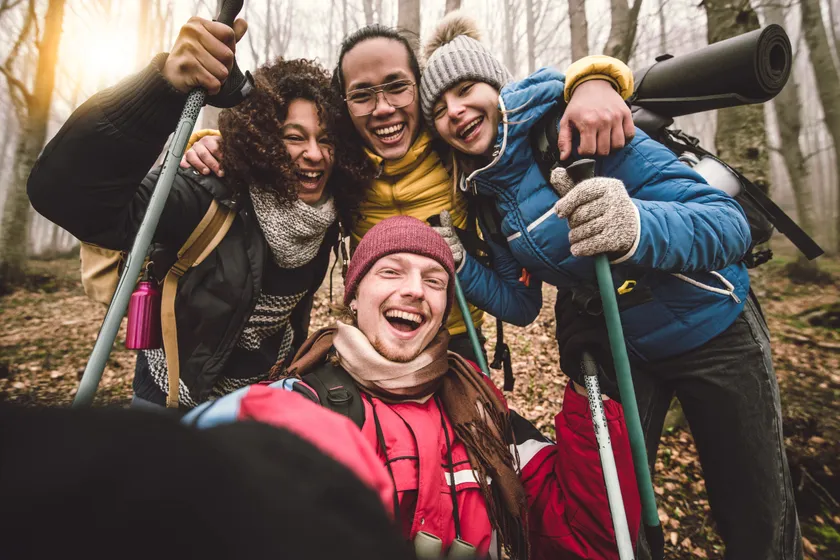 Four friends hiking together